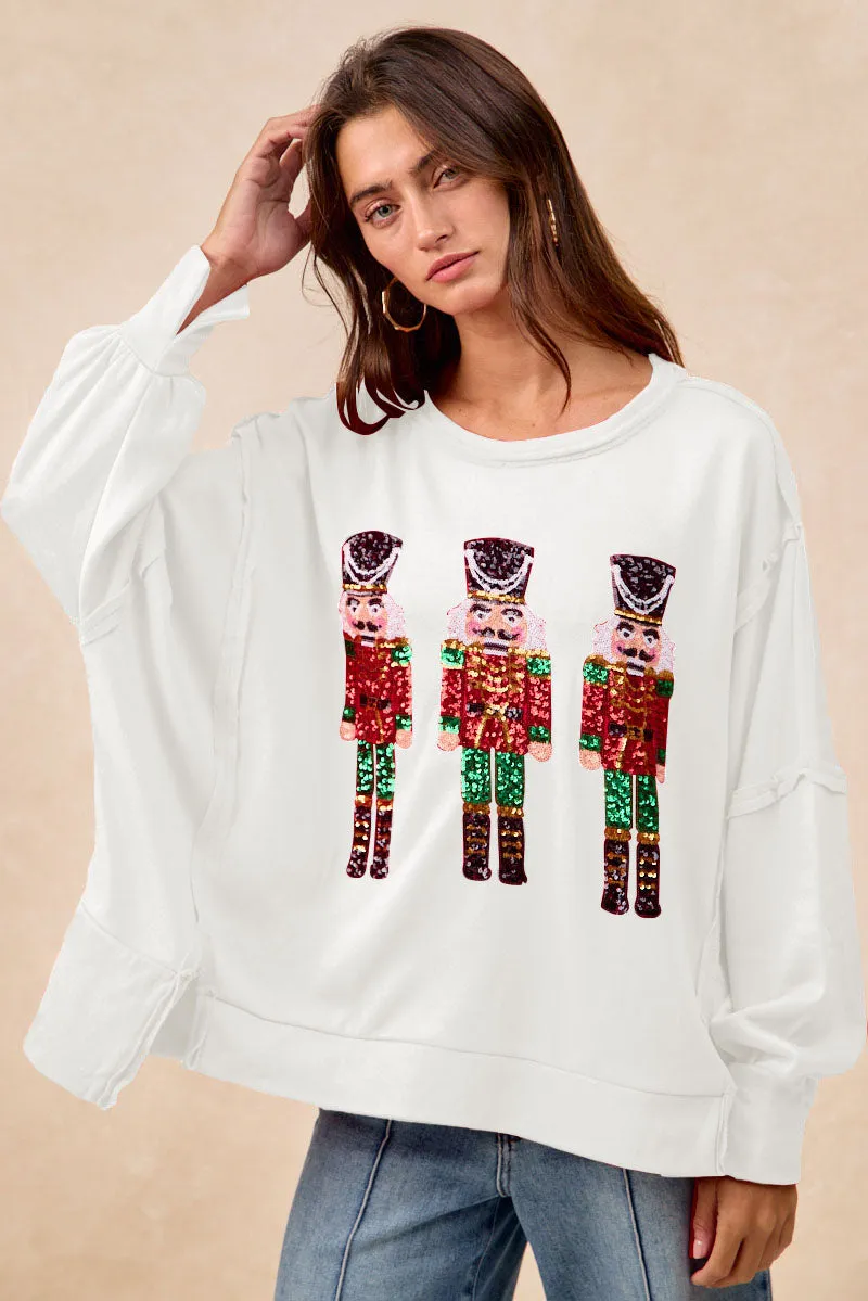 IT3426G-47 | CHRISTMAS SEQUIN NUTCRACKERS EMBROIDERY SWEATSHIRT Sleek Finish