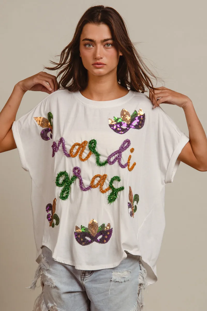 Core Style IP8188G-17 | MARDI GRAS LETTERING AND SEQUIN PATCHES WASHED TOP
