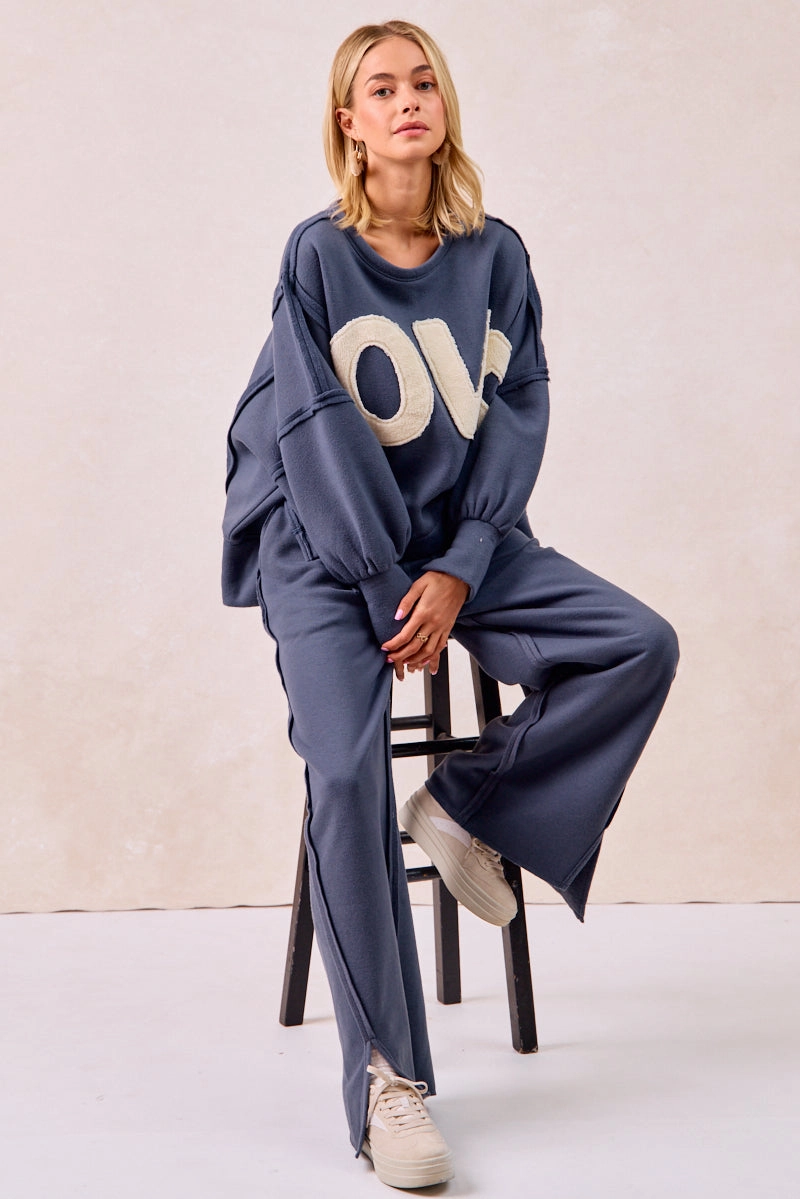 IT3426R-10 | LOVE PATCHWORK FLEECE SWEATSHIRT On The Go Sleek Utility