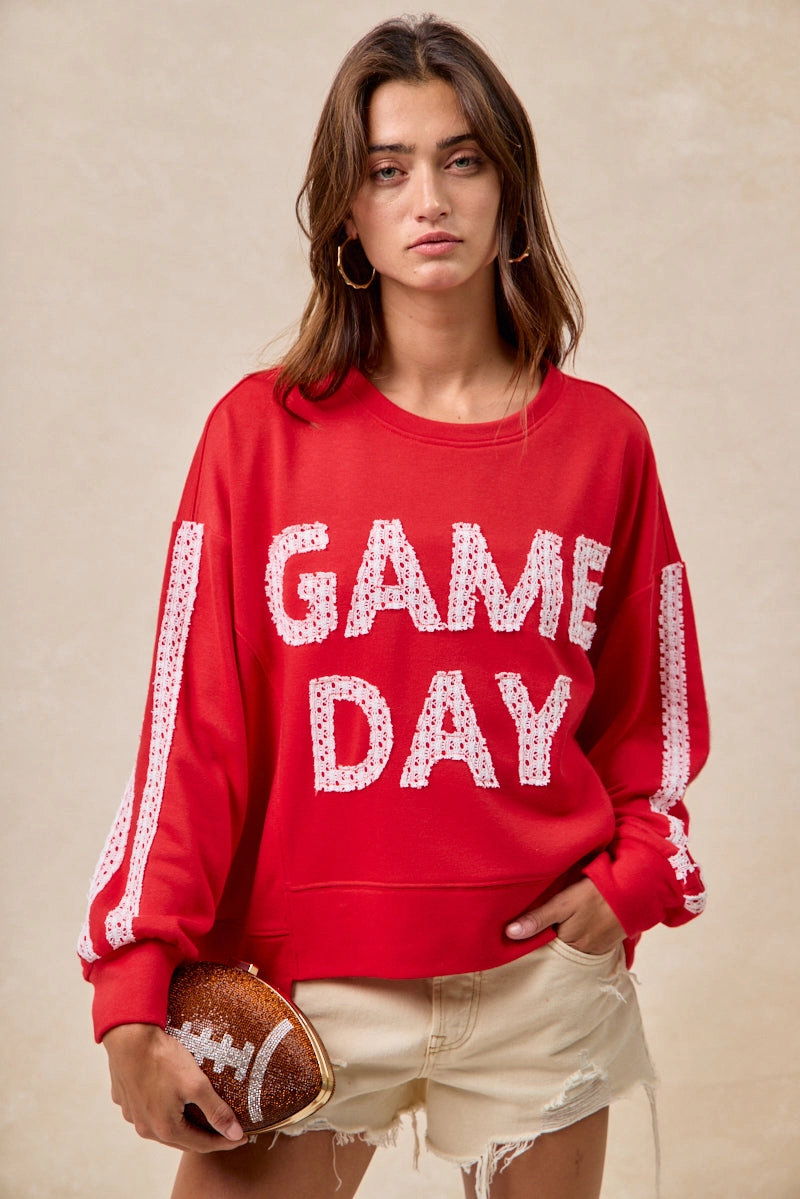 IT4583S-01 | GAMEDAY THEME LACE PATCHWORK TOP WITH UNEVEN HEM All Day Comfort