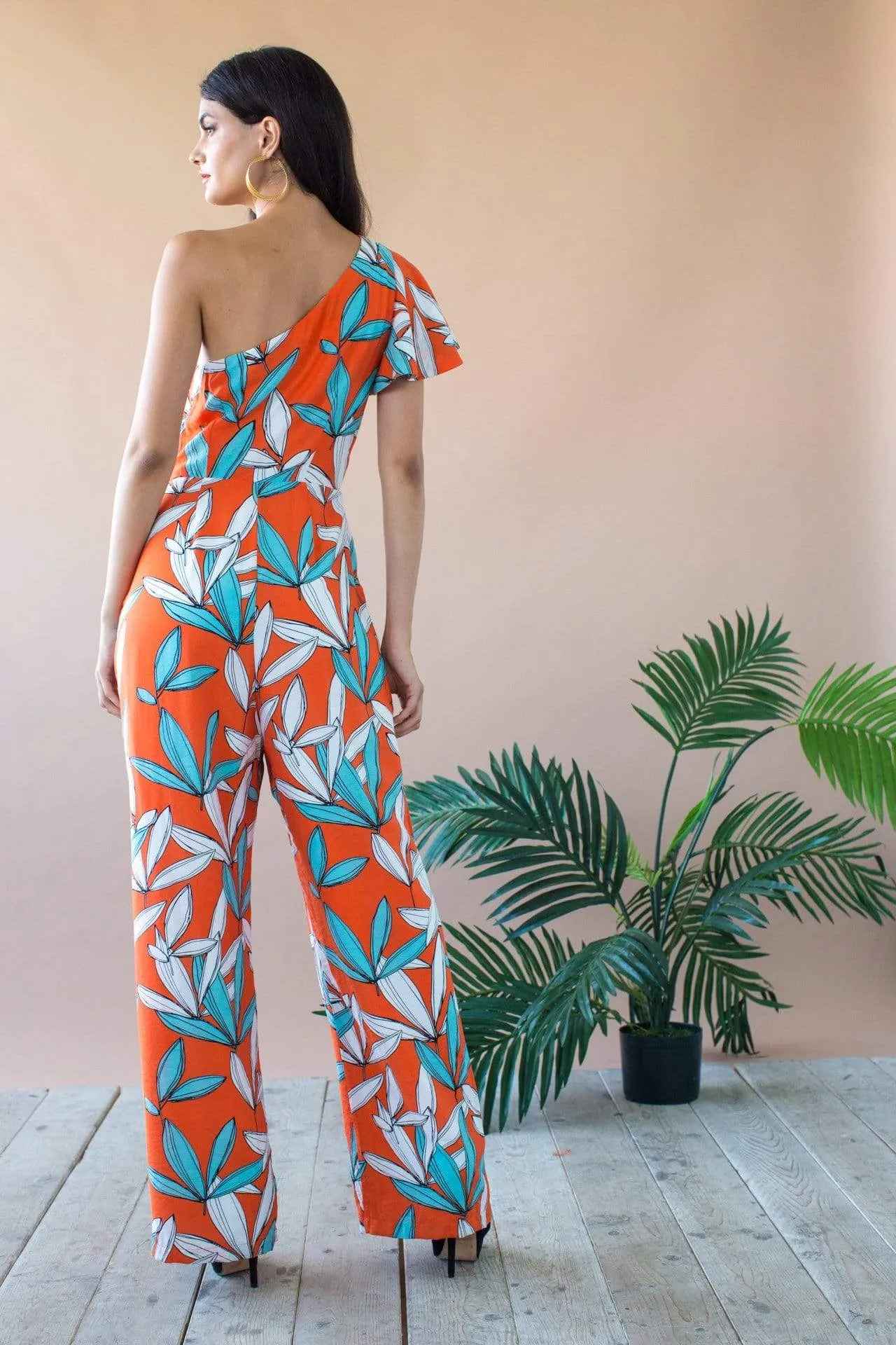 Modern Form Amir One Shoulder Jumpsuit With Flutter Sleeve and Pockets- Rio Flora