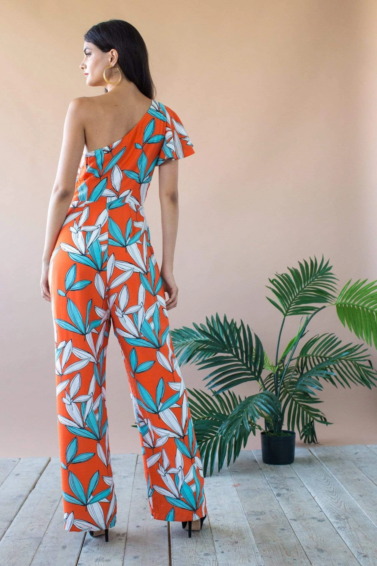 Modern Form Amir One Shoulder Jumpsuit With Flutter Sleeve and Pockets- Rio Flora