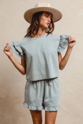 Feminine Fit IB1696-01 | LT DENIM SOLID WITH TIERED RUFFLE DETAILS SHORT SLEEVES TOP AND ELASTIC WAIST SHORTS SET