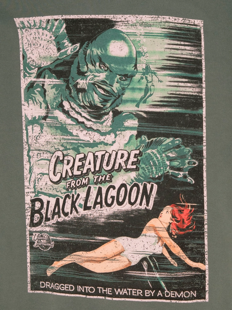 Universal Monsters: Creature from the Black Lagoon Movie Poster Sweatshirt in Vintage Green (unisex) Versatile Fit