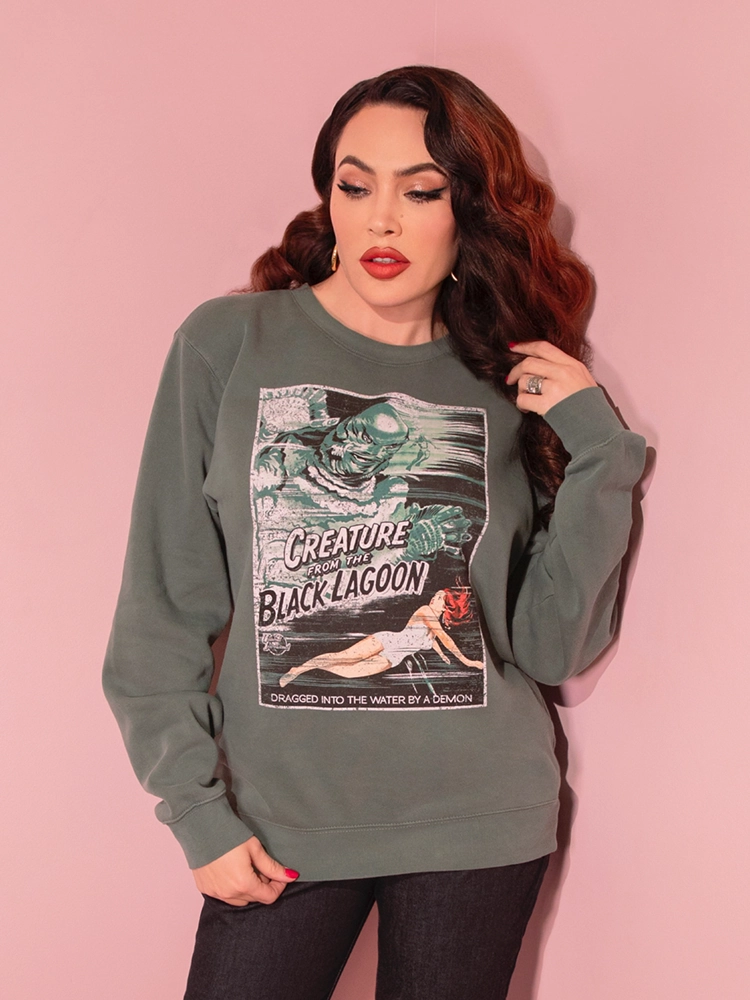 Universal Monsters: Creature from the Black Lagoon Movie Poster Sweatshirt in Vintage Green (unisex) Versatile Fit